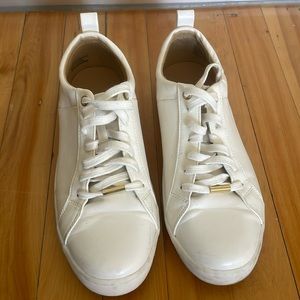 White and gold running shoes size 9 woman